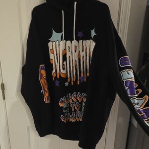 Black Sweater with Bold Graphic Design and Colorful Sleeve Art